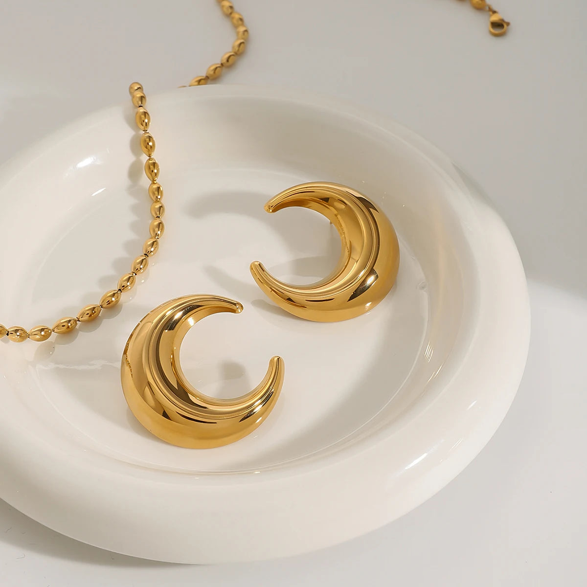 Iconsia Earrings